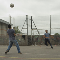 Boys playing football